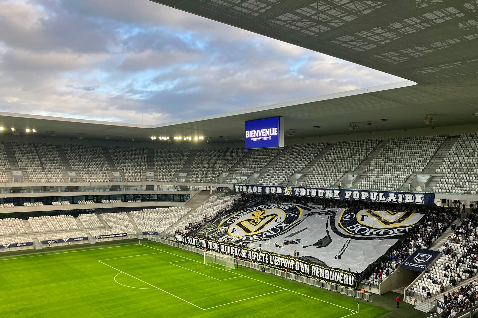 Bordeaux supporters unfurl a large banner Saturday Oct. 12, 2024 before the French Championnat National 2 soccer match between Bordeaux and Avranches. (AP Photo/Jerome Pugmire)