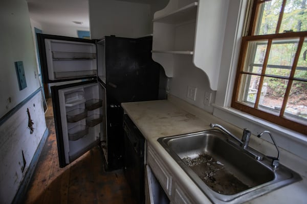 The kitchen in the flood-damaged home of John and Jenny Mackenzie is shown on Sept. 23, 2024 in Peacham, Vt. (AP Photo/Dmitri Beliakov)