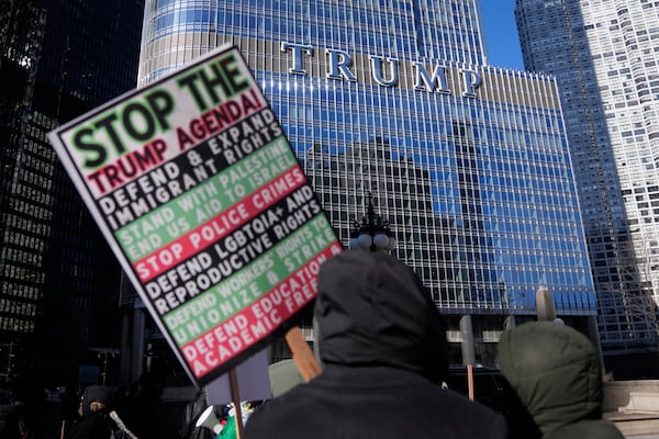 Anti-Trump protesters march to Trump Tower as they rally for a number of issues, including immigrant rights, the Israel-Hamas war, women's reproductive rights, racial equality and others, on the day of President Trump's Inauguration, Monday, Jan. 20, 2025, in Chicago. (AP Photo/Erin Hooley)