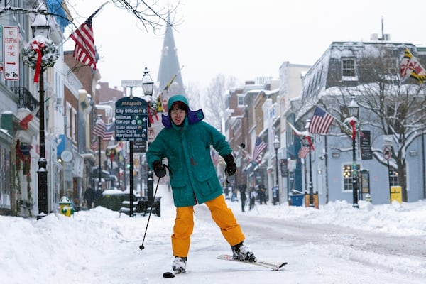 FILE - Cosimos Cendo, of Washington, D.C., skis down Main Street in Annapolis, Md., Jan. 6, 2025, during a snow storm. (AP Photo/Susan Walsh, File)