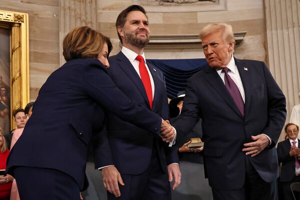 Sen. Amy Klobuchar, D-Minn., left, greets President-elect Donald Trump, right, and Vice President-elect JD Vance, center, at the 60th Presidential Inauguration in the Rotunda of the U.S. Capitol in Washington, Monday, Jan. 20, 2025. (Chip Somodevilla/Pool Photo via AP)