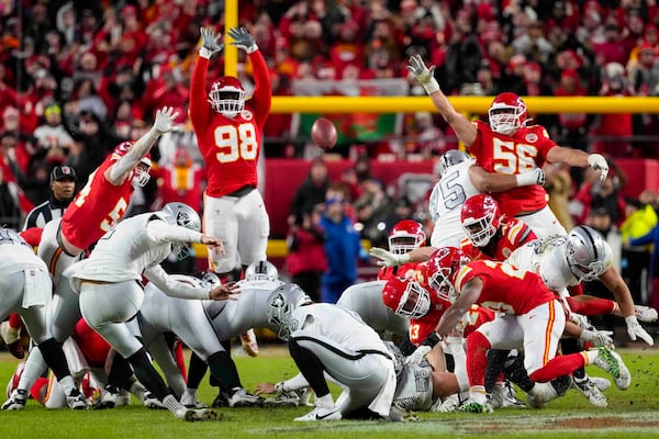 Las Vegas Raiders place kicker Daniel Carlson (2) misses a field goal late in the fourth quarter against the Kansas City Chiefs in an NFL football game in Kansas City, Mo., Friday, Nov. 29, 2024. (AP Photo/Ed Zurga)