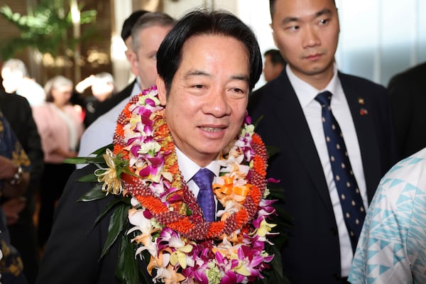 Taiwan President Lai Ching-te greets people at the Kahala Hotel and Resort Saturday, Nov. 30, 2024 in Honolulu. (AP Photo/Marco Garcia)