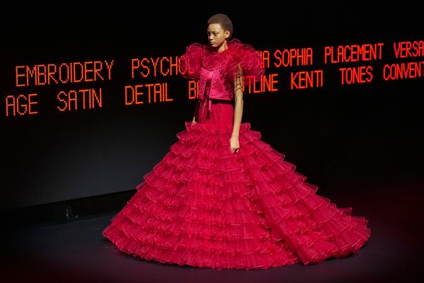 A model wears a creation as part of the Valentino Haute Couture Spring Summer 2025 collection, that was presented in Paris, Wednesday, Jan. 29, 2025. (AP Photo/Lewis Joly).