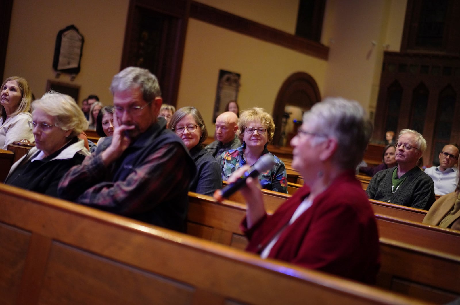 Attendees share their thoughts and reflections at the end of a "Contemplative Citizenship" service at St. James Episcopal Church in Lancaster, Pa., on Tuesday, Oct. 15, 2024. (AP Photo/Jessie Wardarski)