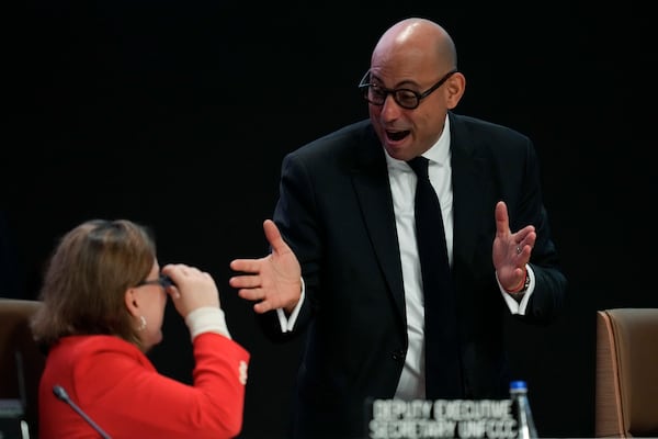 Simon Stiell, United Nations climate chief, speaks ahead of a plenary session at the COP29 U.N. Climate Summit, Monday, Nov. 18, 2024, in Baku, Azerbaijan. (AP Photo/Rafiq Maqbool)