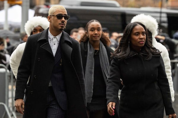 Quincy Brown, left, stepson of Sean "Diddy Combs and other family members arrive at Manhattan federal court, Friday, Nov. 22 2024, in New York. (AP Photo/Yuki Iwamura)