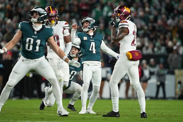 Philadelphia Eagles place-kicker Jake Elliott (4) watches his missed field goal attempt during the first half of an NFL football game against the Washington Commanders Thursday, Nov. 14, 2024, in Philadelphia. (AP Photo/Matt Slocum)