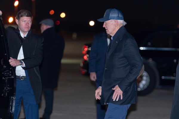 President Joe Biden walks to his car upon arriving at Joint Base Andrews, Md., Saturday, Nov. 30, 2024, en route to the White House. (AP Photo/Jose Luis Magana)