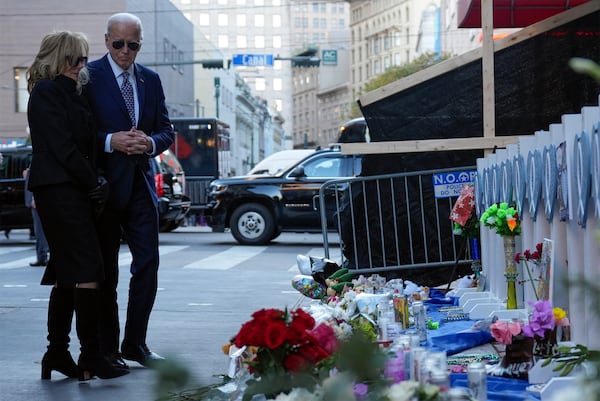 President Joe Biden and first lady Jill Biden stop at the site of the deadly New Years truck attack, in New Orleans, Monday, Jan. 6, 2025. (AP Photo/Stephanie Scarbrough)