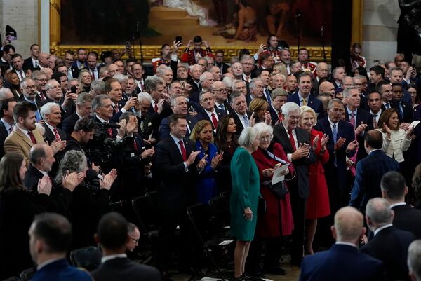 Guests arrive arrive before the 60th Presidential Inauguration in the Rotunda of the U.S. Capitol in Washington, Monday, Jan. 20, 2025. (AP Photo/Julia Demaree Nikhinson, Pool)