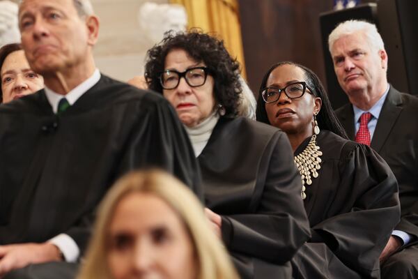 From left, Supreme Court Chief Justice John Roberts, Supreme Court Justice Sonia Sotomayor and Supreme Court Justice Ketanji Brown Jackson listen as President Donald Trump speaks during the 60th Presidential Inauguration in the Rotunda of the U.S. Capitol in Washington, Monday, Jan. 20, 2025. (Chip Somodevilla/Pool Photo via AP)