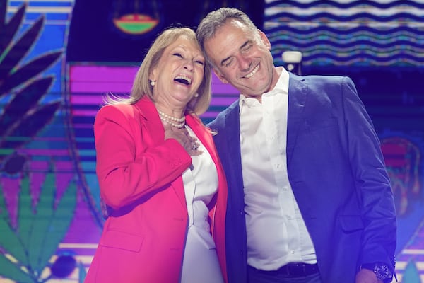 Yamandu Orsi, candidate for the Broad Front (Frente Amplio), and running mate Carolina Cosse, right, celebrate their victory in the presidential run-off election in Montevideo, Uruguay, Sunday, Nov. 24, 2024. (AP Photo/Natacha Pisarenko)