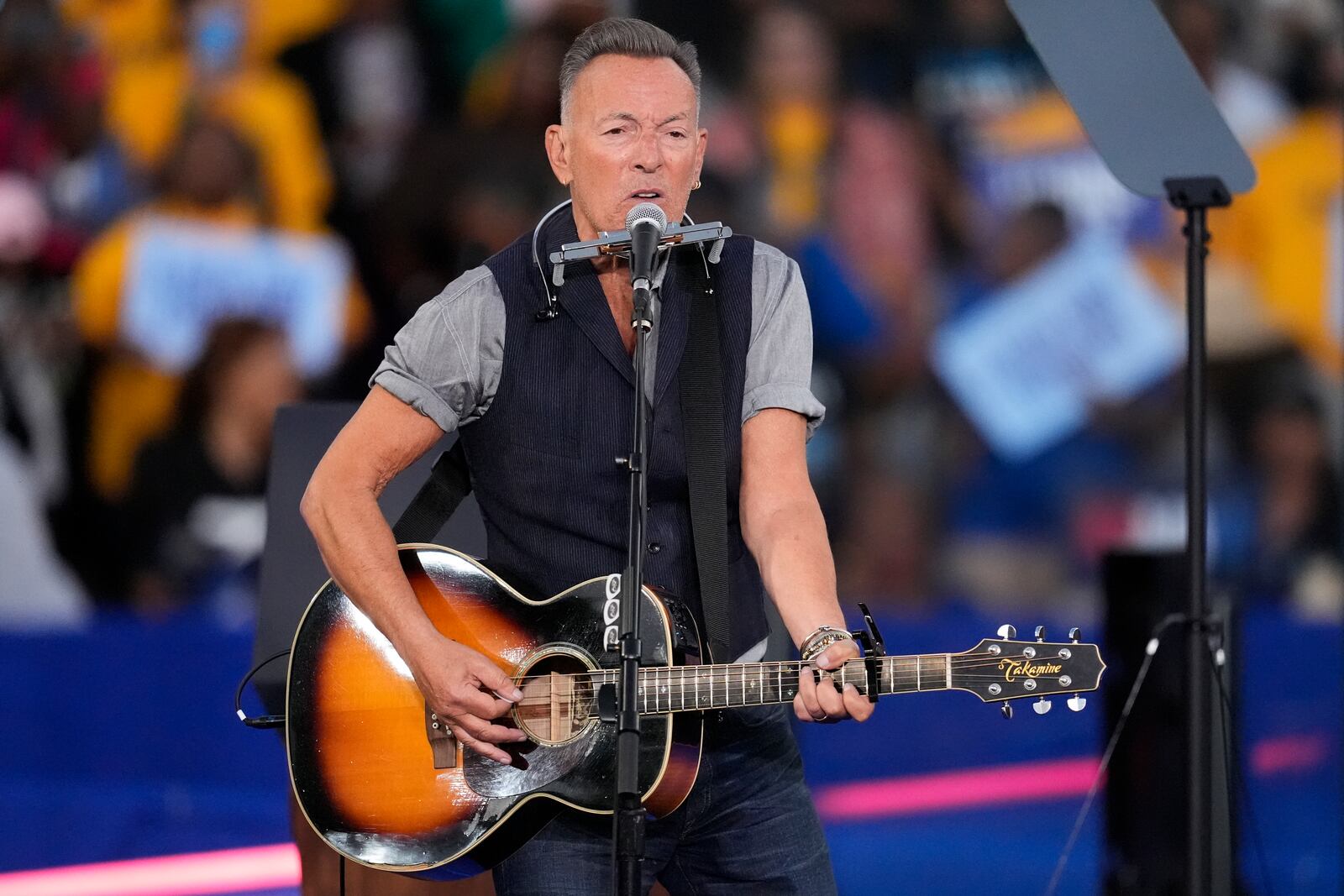 Bruce Springsteen performs at a campaign rally supporting Democratic presidential nominee Vice President Kamala Harris, Thursday, Oct. 24, 2024, in Clarkston, Ga. (AP Photo/Mike Stewart)