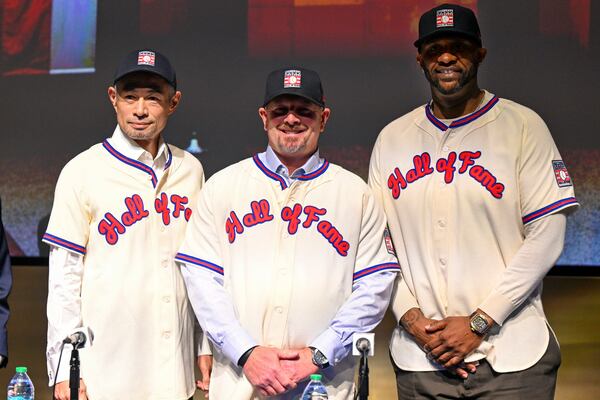 Newly-elected Baseball Hall of Fame members, from left, Ichiro Suzuki, left, Billy Wagner and CC Sabathia pose for photo during a news conference, Thursday, Jan. 23, 2025, in Cooperstown, N.Y. (AP Photo/Hans Pennink)