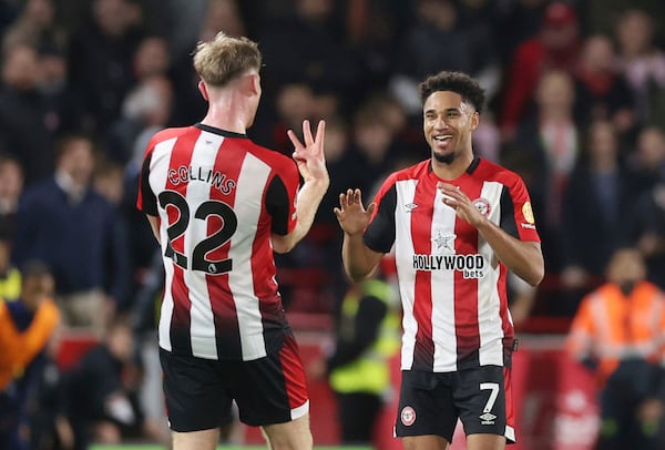 Brentford's Kevin Schade celebrates scoring his side's fourth goal of the game, during the English Premier League soccer match between Brentford and Leicester City at the Gtech Community Stadium, in Brentford, England, Saturday, Nov. 30, 2024. (Steven Paston/PA via AP)