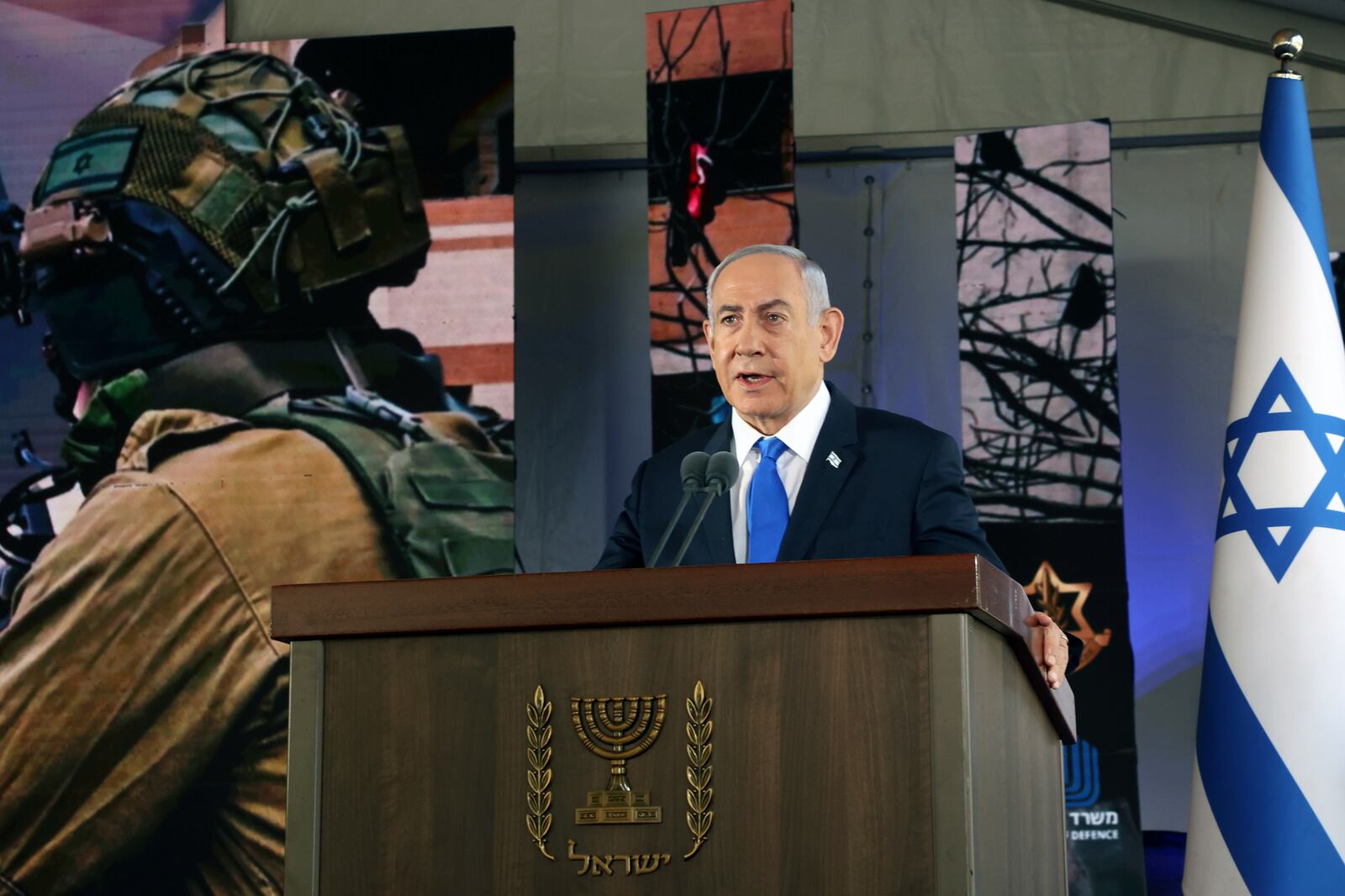 FILE - Israel's Prime Minister Benjamin Netanyahu speaks during a ceremony marking the Hebrew calendar anniversary of the Hamas attack on October 7 last year that sparked the ongoing war in Gaza, at the Mount Herzl military cemetery in Jerusalem, Israel, on Oct. 27, 2024. (Gil Cohen-Magen/Pool Photo via AP, File)