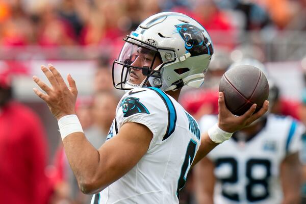 Carolina Panthers quarterback Bryce Young passes against the Tampa Bay Buccaneers during the first half of an NFL football game Sunday, Dec. 29, 2024, in Tampa, Fla. (AP Photo/Chris O'Meara)