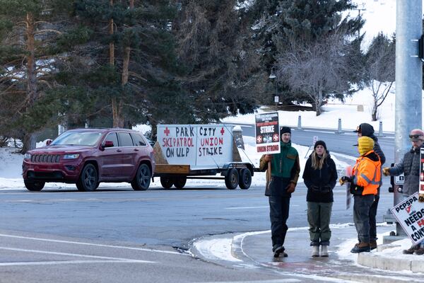 Park City Ski Patrol on strike requesting livable wages in Park City, Utah, Jan 7. 2025. (AP Photo/Melissa Majchrzak)