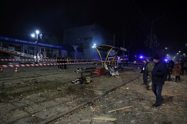 Dead bodies of people killed in a Russian airstrike are seen at a tram station in Zaporizhzhia, Ukraine, Wednesday Jan. 8, 2025. (AP Photo/Oleg Movchaniuk)