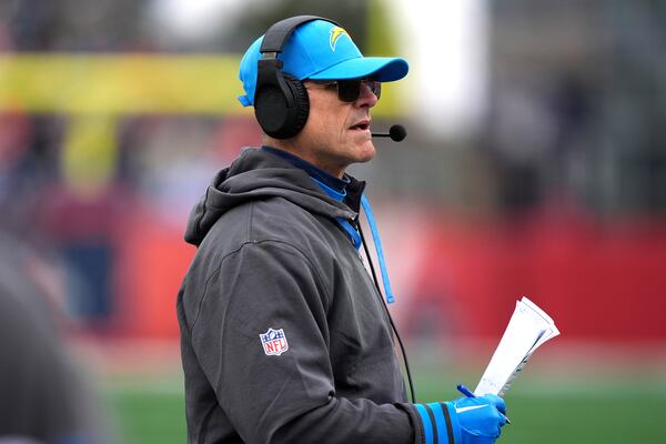 Los Angeles Chargers head coach Jim Harbaugh during the first half of an NFL football game against the New England Patriots, Saturday, Dec. 28, 2024, in Foxborough, Mass. (AP Photo/Robert F. Bukaty)