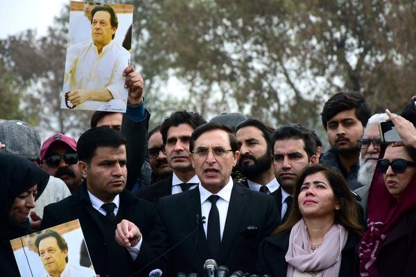 Gohar Khan, center, Chairman of Pakistan's already-imprisoned former Prime Minister Imran Khan's 'Pakistan's Tehreek-e-Insaf party' talks to media after a court verdict on corruption case against Khan at outside Adiala prison, in Rawalpindi, Pakistan, Friday, Jan. 17, 2025. (AP Photo/W.K. Yousufzai)