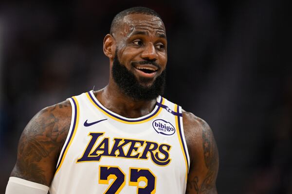 Los Angeles Lakers forward LeBron James (23) looks on during the first half of an NBA basketball game against the Golden State Warriors, Wednesday, Dec. 25, 2024, in San Francisco. (AP Photo/Eakin Howard)