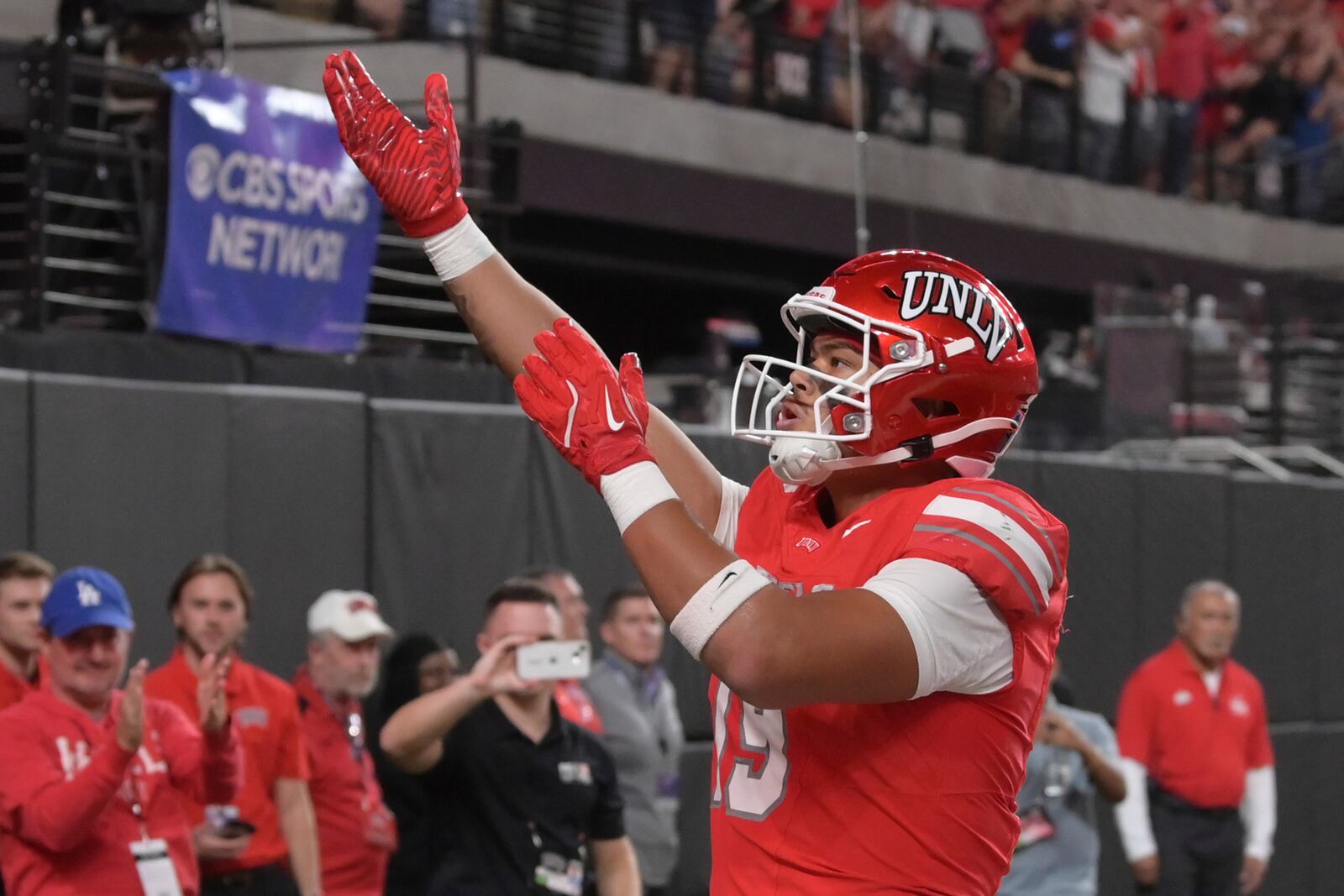 UNLV tight end Kaleo Ballungay (19) celebrates a touchdown against Boise State during the first half of an NCAA college football game Friday, Oct. 25, 2024, in Las Vegas. (AP Photo/Sam Morris)