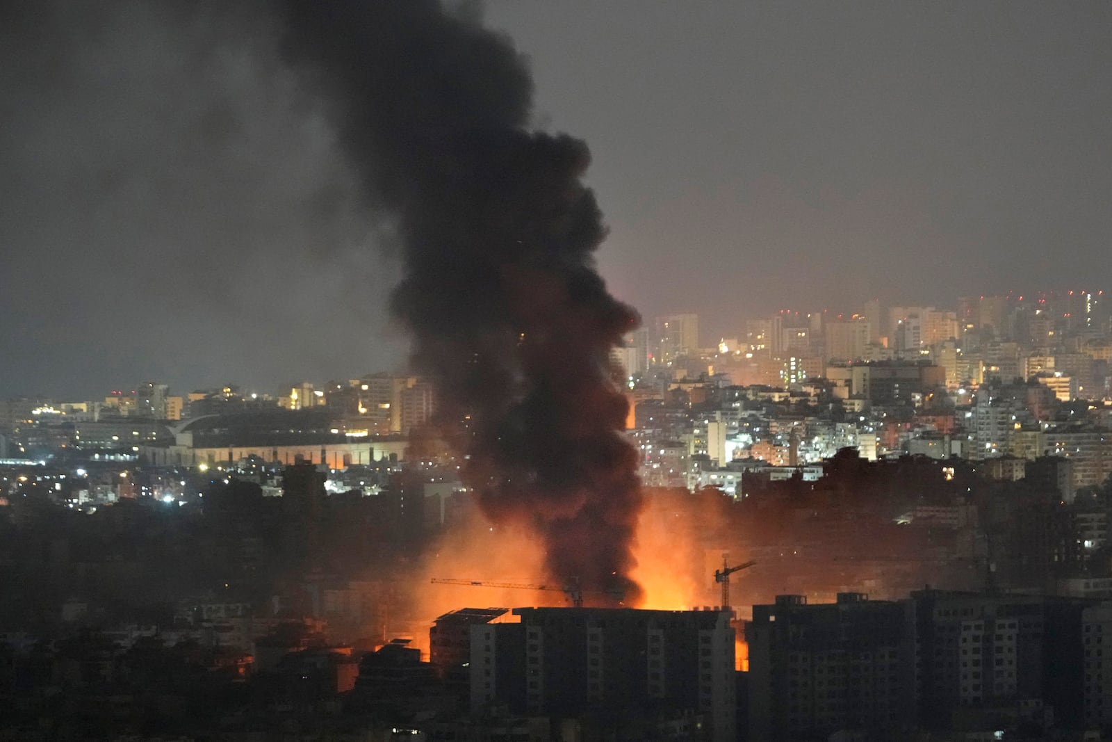 Flame and smoke rise from Israeli airstrikes on Dahiyeh, in the southern suburb of Beirut, Lebanon, early Friday, Nov. 1, 2024. (AP Photo/Hussein Malla)