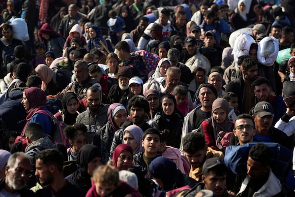 Displaced Palestinians return to their homes in the northern Gaza Strip, following Israel's decision to allow thousands of them to go back for the first time since the early weeks of the 15-month war with Hamas, Monday, Jan. 27, 2025. (AP Photo/Abdel Kareem Hana)