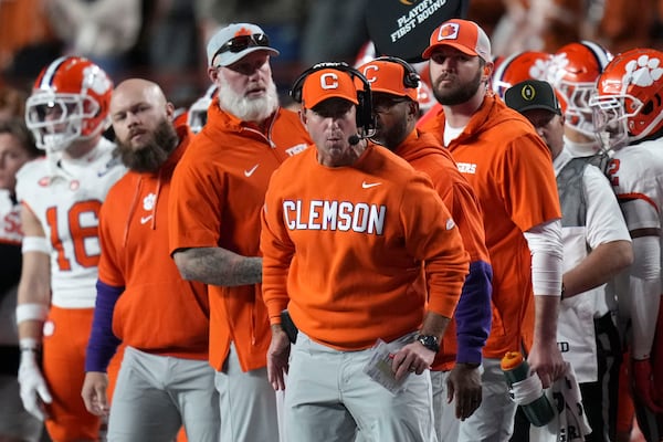 Clemson head coach Dabo Swinney watches from the sideline during the second half against Texas in the first round of the College Football Playoff, Saturday, Dec. 21, 2024, in Austin, Texas. (AP Photo/Eric Gay)