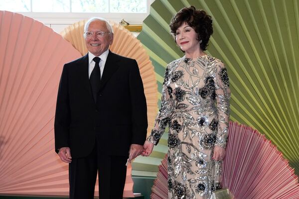 FILE - Lynda Resnick and Stewart Resnick arrive at the Booksellers area of the White House for a state dinner, April 10, 2024, in Washington. (AP Photo/Jacquelyn Martin, File)