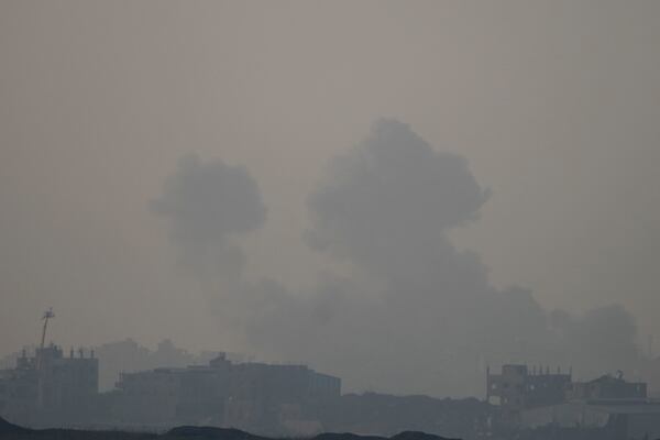 Smoke rises following an Israeli airstrike in the Gaza Strip, as seen from southern Israel, Thursday, Jan. 16, 2025. (AP Photo/Ariel Schalit)