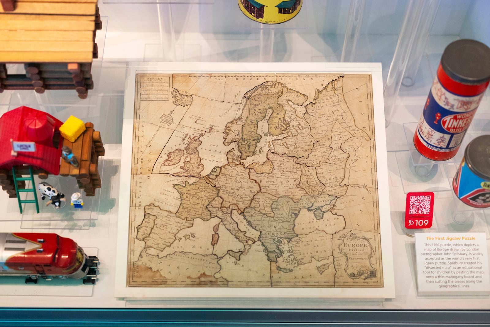 One of the world's first jigsaw puzzles from 1766 is displayed in the Toy Hall of Fame at The Strong National Museum of Play, Tuesday, Oct. 15, 2024, in Rochester, N.Y. (AP Photo/Lauren Petracca)