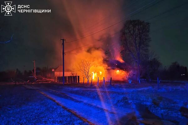 In this photo provided by the Ukrainian Emergency Service, burning buildings are seen on site after a Russian drone attack in Chernihiv region, Ukraine, early Friday, Dec. 13, 2024. (Ukrainian Emergency Service via AP Photo)