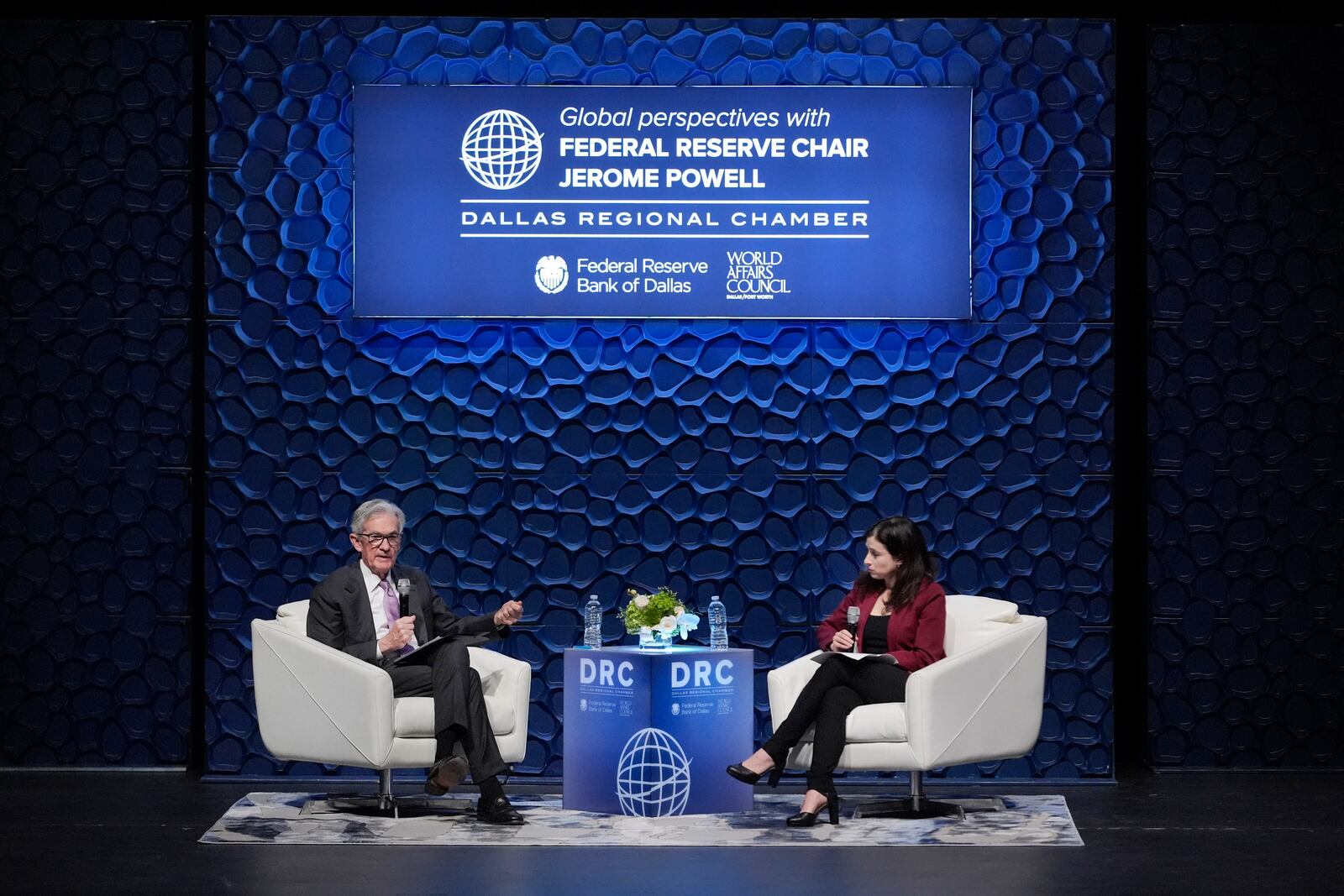 Federal Reserve Chair Jerome Powell, left, speaks to the Dallas Regional Chamber as moderator Catherine Rampell looks during an event in Music Hall at Fair Park Thursday, Nov. 14, 2024, in Dallas. (AP Photo/LM Otero)