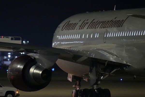 A plane with three American citizens, Mark Swidan, Kai Li and John Leung who were imprisoned for years by China, arrives at Joint Base San Antonio Lackland, in San Antonio, Wednesday, Nov. 27, 2024. (AP Photo/Eric Gay)