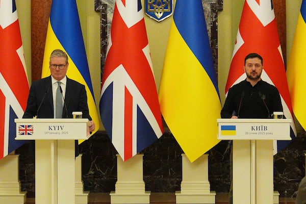 British Prime Minister Keir Starmer and President Volodymyr Zelensky, right, speak ahead of their bilateral talks at Mariinskyi Palace in Kyiv, Ukraine, Thursday, Jan. 16, 2025. (Carl Court, Pool Photo via AP)