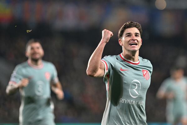 Atletico's Julian Alvarez of Atletico celebrates scoring during the Champions League opening phase soccer match between Sparta Prague and Atletico Madrid in Prague, Czech Republic, Tuesday, Nov. 26, 2024. (Michaela Rihova/CTK via AP)