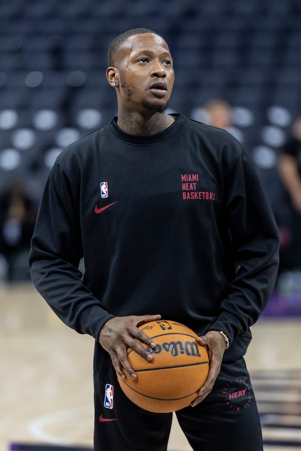 Miami Heat guard Terry Rozier III warms up before an NBA basketball game against the Sacramento Kings, Monday, Jan. 6, 2025, in Sacramento, Calif. (AP Photo/Sara Nevis)