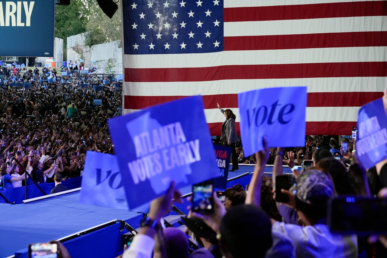 Democratic presidential nominee Vice President Kamala Harris waves to the crowd as she arrives to speak at a campaign event at Lakewood Amphitheatre, Saturday, Oct. 19, 2024, in Atlanta. (AP Photo/Jacquelyn Martin)