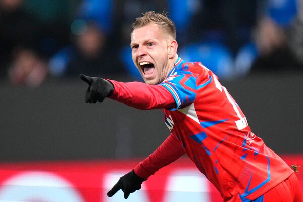 Plzen's Matej Vydra celebrates after scoring his side's opening goal during the Europa League soccer match between Viktoria Plzen and Manchester United at the Doosan Arena in Plzen, Czech Republic, Thursday, Dec. 12, 2024. (AP Photo/Petr David Josek)