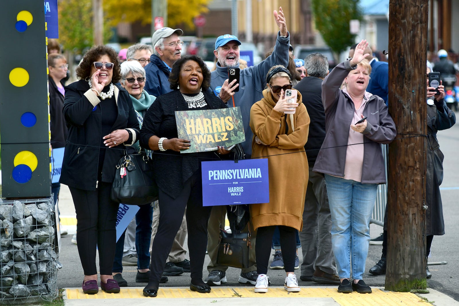 Supporters cheer for former President Bill Clinton while he campaigns for Democratic Party presidential nominee Vice President Kamala Harris during a stop at Bottle Works in the Cambria City section of Johnstown, Pa., Tuesday, Oct. 29, 2024. (Thomas Slusser/The Tribune-Democrat via AP)