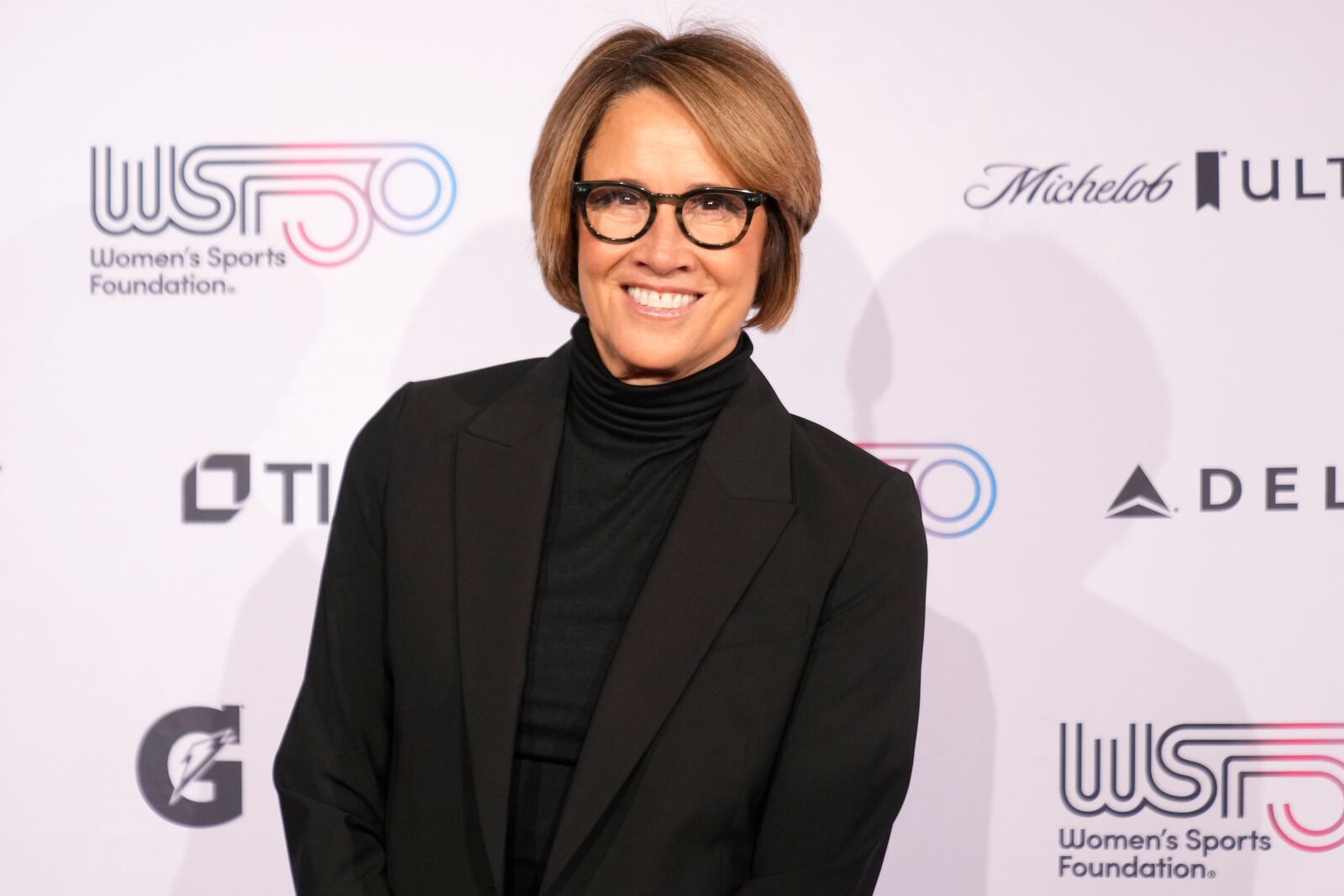 Mary Carillo poses for photos on the red carpet at the Women's Sports Foundation's Annual Salute to Women in Sports, Wednesday, Oct. 16, 2024, in New York. (AP Photo/Pamela Smith)