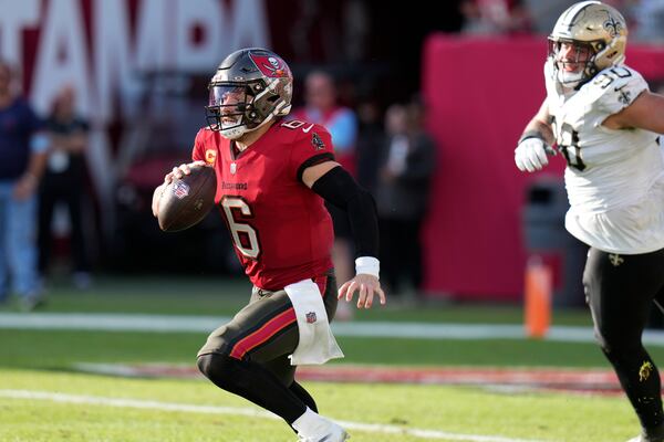 Tampa Bay Buccaneers quarterback Baker Mayfield (6) carries on a 27-yard run during the second half of an NFL football game against the New Orleans SaintsSunday, Jan. 5, 2025, in Tampa, Fla. (AP Photo/Chris O'Meara)