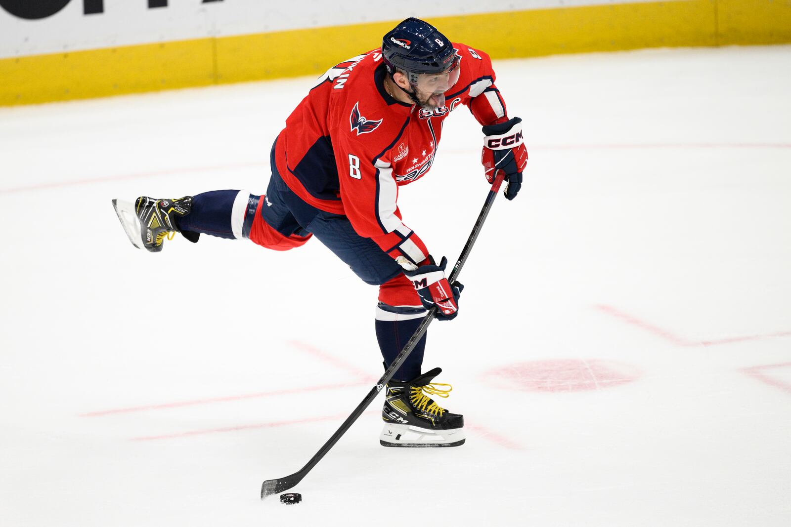 Washington Capitals left wing Alex Ovechkin (8) shoots the puck during the third period of an NHL hockey game against the Montreal Canadiens, Thursday, Oct. 31, 2024, in Washington. The Capitals won 6-3. (AP Photo/Nick Wass)