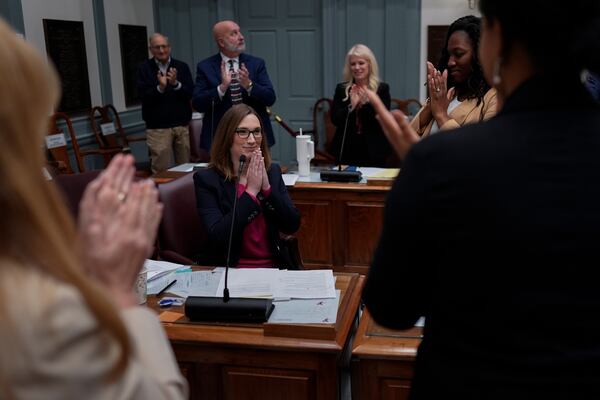 U.S.-Rep.-elect Sarah McBride, D-Del., acknowledges applause after her farewell speech on the Senate floor during a special session, her last day as a Delaware state senator, at the Delaware Legislative Hall in Dover, Del., Monday, Dec. 16, 2024. (AP Photo/Carolyn Kaster)