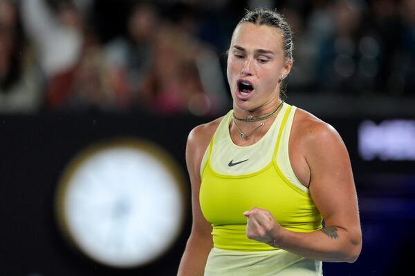 Aryna Sabalenka of Belarus reacts during her semifinal match against Paula Badosa of Spain at the Australian Open tennis championship in Melbourne, Australia, Thursday, Jan. 23, 2025. (AP Photo/Asanka Brendon Ratnayake)