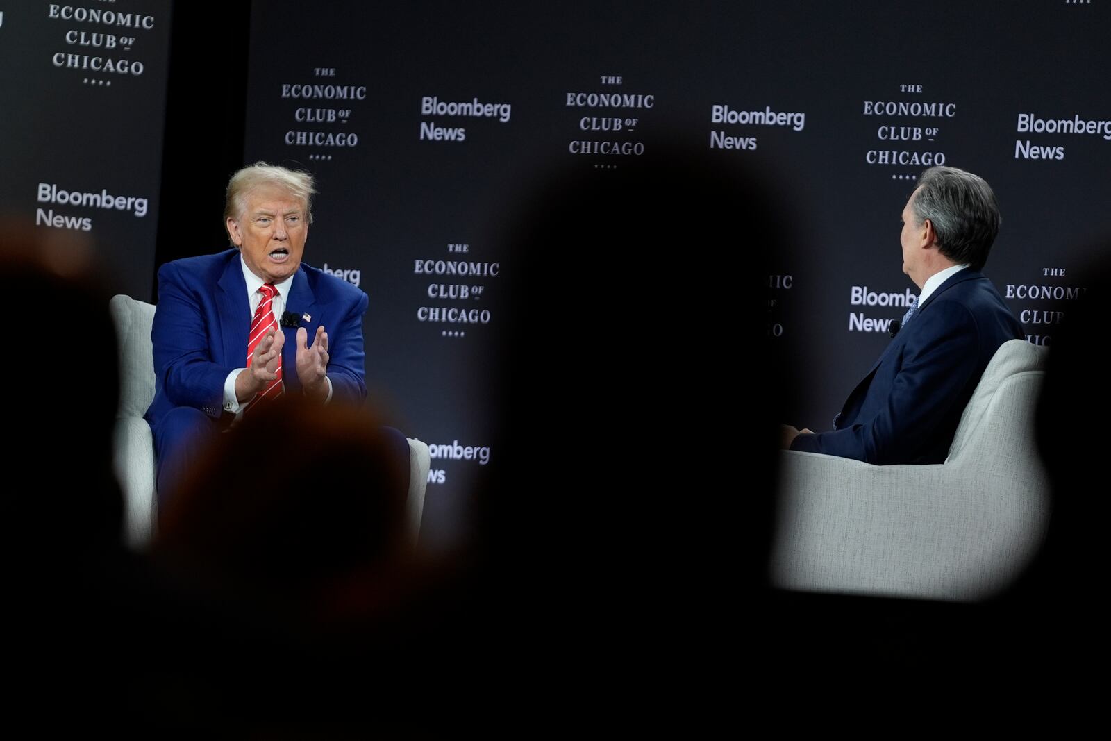 Republican presidential nominee former President Donald Trump speaks during an interview with Bloomberg News Editor-in-Chief John Micklethwait during an event with the Economic Club of Chicago, Tuesday, Oct. 15, 2024, in Chicago. (AP Photo/Evan Vucci)