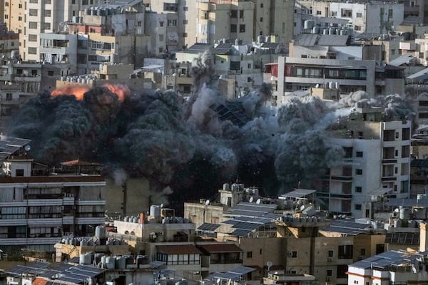 Flame and smoke rise after an Israeli airstrike on Dahiyeh, in the southern suburb of Beirut, Lebanon, Saturday, Nov. 16, 2024. (AP Photo/Bilal Hussein)